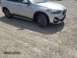 2021 BMW X1 xDrive28i z VIN WBXJG9C07M5S85128, wystawiony jako Copart lot #53477145 z przebiegiem 18 370 mil mil oraz Szkody całkowita. Historia ofert i sprzedaży dostępna na DreamBid. Obrazek 4.