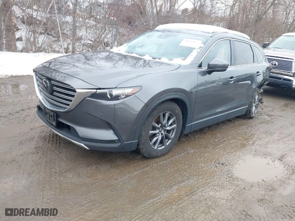 2021 Mazda CX-9 Touring with VIN JM3TCBCY4M0502895, listed as a IAAI auction lot 41476053 with 101,025 mi miles. Bid and sale history available at carsss.com. Image 2.