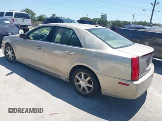 2008 Cadillac STS RWD with VIN 1G6DW67V780153199, listed as a IAAI auction lot 42058808 with 164,961 mi miles and . Bid and sale history available at DreamBid. Image 3.