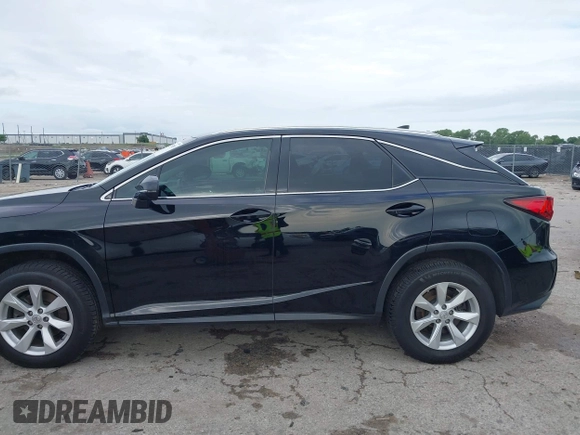 2016 Lexus RX 350 z VIN 2T2BZMCA4GC017342, wystawiony jako IAAI lot #42357093 z przebiegiem 142 515 mil mil oraz . Historia ofert i sprzedaży dostępna na DreamBid. Obrazek 14.