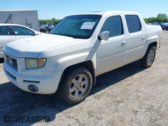 2006 Honda Ridgeline RTL with VIN 2HJYK16506H562857, listed as a IAAI auction lot 42169379 with 154,194 mi miles. Bid and sale history available at carsss.com. Image 2.