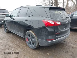 2021 Chevrolet Equinox Premier z VIN 2GNAXNEV4M6125086, wystawiony jako IAAI lot #41475387 z przebiegiem 53 387 mil mil oraz . Historia ofert i sprzedaży dostępna na DreamBid. Obrazek 3.
