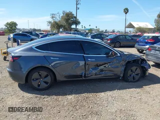 2020 Tesla Model 3 Standard Range Plus with VIN 5YJ3E1EA5LF644282, listed as a IAAI auction lot 41710124 with 69,969 mi miles and . Bid and sale history available at DreamBid. Image 12.