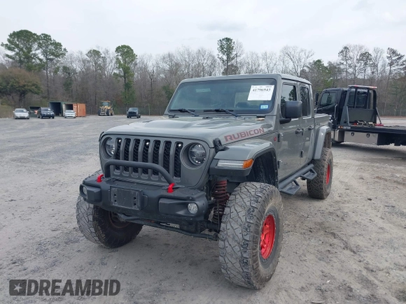 2021 Jeep Gladiator Rubicon with VIN 1C6JJTBG7ML554354, listed as a IAAI auction lot 41796943 with 61,513 mi miles and . Bid and sale history available at DreamBid. Image 18.