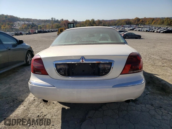 2002 Lincoln Continental with VIN 1LNHM97V62Y643532, listed as a Copart auction lot 76015984 with 154,374 mi miles and Salvage Title. Bid and sale history available at carsss.com. Image 6.