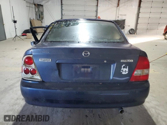2000 Mazda Protege ES with VIN JM1BJ221XY0211385, listed as a Copart auction lot 48225605 with Not Provided miles and Non Repairable. Bid and sale history available at DreamBid. Image 6.