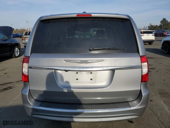 2014 Chrysler Town & Country Touring with VIN 2C4RC1BG7ER412802, listed as a Copart auction lot 84749904 with 64,853 mi miles and Salvage Title. Bid and sale history available at carsss.com. Image 6.