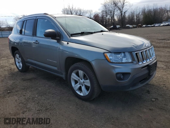 2012 Jeep Compass Sport with VIN 1C4NJDBB1CD562477, listed as a Copart auction lot 50935955 with 79,619 mi miles and Salvage Title. Bid and sale history available at carsss.com. Image 4.