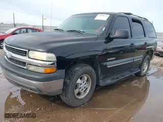 2003 Chevrolet Tahoe LT with VIN 1GNEC13Z83R264751, listed as a IAAI auction lot 41898933 with 300,977 mi miles. Bid and sale history available at carsss.com. Image 2.