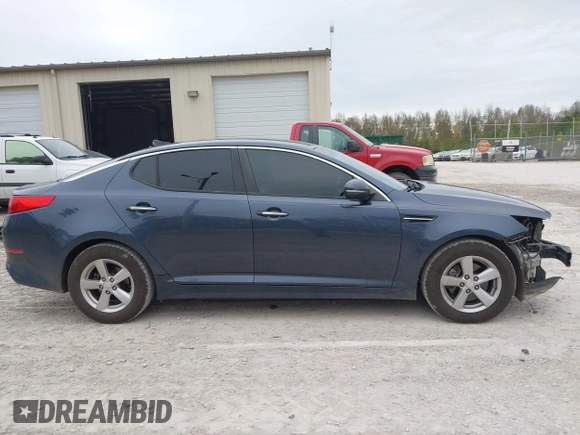 2015 Kia Optima LX z VIN 5XXGM4A79FG441283, wystawiony jako IAAI lot #40834778 z przebiegiem 210 110 mil mil oraz . Historia ofert i sprzedaży dostępna na DreamBid. Obrazek 14.