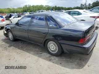 1989 Ford Taurus z VIN 1FABP54Y5KA202935, wystawiony jako Copart lot #59355304 z przebiegiem 67 510 mil mil oraz Szkoda całkowita • Salvage title. Historia ofert i sprzedaży dostępna na DreamBid. Obrazek 2.