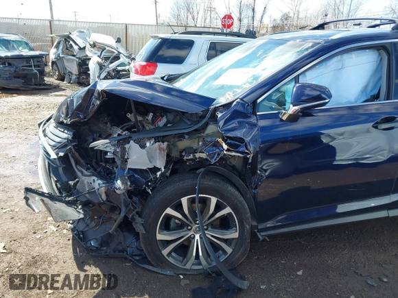 2016 Lexus RX 350 with VIN 2T2BZMCA2GC004895, listed as a IAAI auction lot 41859749 with 104,370 mi miles and . Bid and sale history available at DreamBid. Image 6.