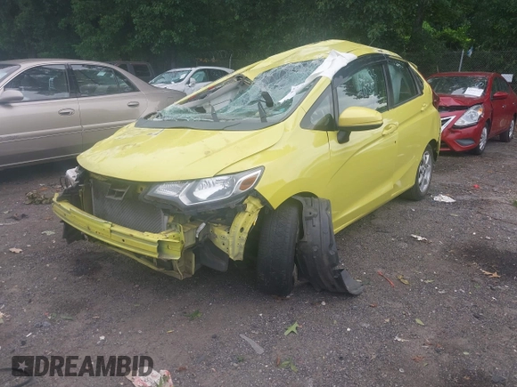 2015 Honda Fit LX z VIN 3HGGK5H5XFM734030, wystawiony jako IAAI lot #42596983 z przebiegiem 243 436 mil mil oraz . Historia ofert i sprzedaży dostępna na DreamBid. Obrazek 2.