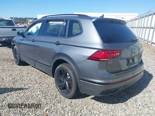 2024 Volkswagen Tiguan SE R-Line Black with VIN 3VVCB7AX2RM114556, listed as a IAAI auction lot 41887373 with 7,013 mi miles and . Bid and sale history available at DreamBid. Image 3.