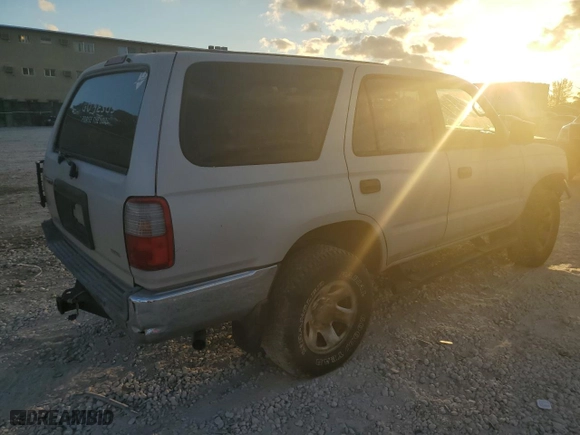 2000 Toyota 4Runner with VIN JT3GM84RXY0063021, listed as a Copart auction lot 82144274 with 310,186 mi miles and Salvage Title. Bid and sale history available at carsss.com. Image 3.