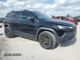 2019 Jeep Cherokee Trailhawk с VIN 1C4PJMBXXKD342371, выставлен на аукционе Copart как лот 55144715 с пробегом 78 433 миль миль и Списание • Salvage title. История ставок и продаж доступна на DreamBid. Изображение 4.