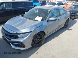 2020 Honda Civic Si with VIN 2HGFC1E57LH704323, listed as a IAAI auction lot 41742768 with 34,246 mi miles and . Bid and sale history available at DreamBid. Image 2.