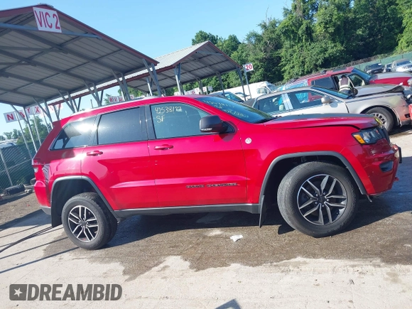 2021 Jeep Grand Cherokee Trailhawk with VIN 1C4RJFLG8MC549403, listed as a IAAI auction lot 42538177 with 33,124 mi miles and . Bid and sale history available at DreamBid. Image 13.