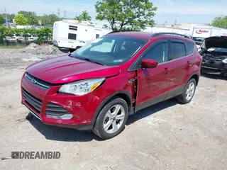 2016 Ford Escape SE z VIN 1FMCU9GX1GUC04815, wystawiony jako IAAI lot #42235499 z przebiegiem 84 713 mil mil oraz . Historia ofert i sprzedaży dostępna na DreamBid. Obrazek 2.