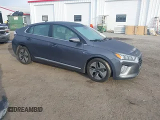 2020 Hyundai Ioniq SEL z VIN KMHC85LCXLU208677, wystawiony jako IAAI lot #40872216 z przebiegiem 156 159 mil mil oraz . Historia ofert i sprzedaży dostępna na DreamBid. Obrazek 1.
