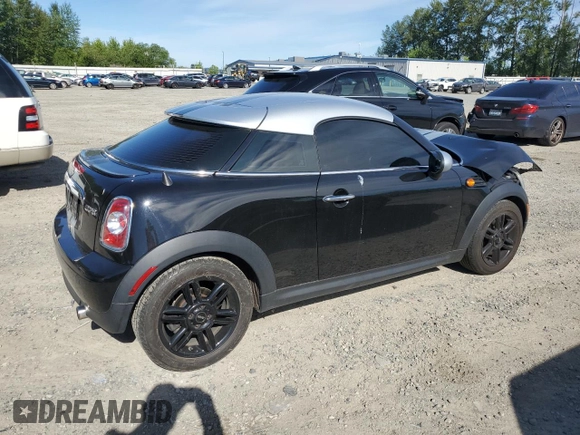2015 MINI Cooper Coupe with VIN WMWSX1C52FT508184, listed as a Copart auction lot 60639664 with 95,502 mi miles and Salvage Title. Bid and sale history available at carsss.com. Image 3.