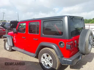 2018 Jeep Wrangler Unlimited Sport z VIN 1C4HJXDG9JW227864, wystawiony jako IAAI lot #42504877 z przebiegiem 53 378 mil mil oraz . Historia ofert i sprzedaży dostępna na DreamBid. Obrazek 14.