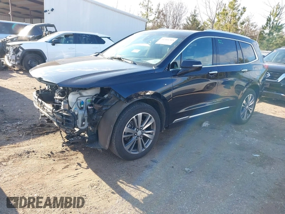 2021 Cadillac XT6 Premium Luxury with VIN 1GYKPFRS9MZ141298, listed as a IAAI auction lot 41304705 with 87,470 mi miles. Bid and sale history available at carsss.com. Image 2.