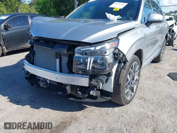 2023 Hyundai Santa Fe Calligraphy with VIN 5NMS54AL2PH560512, listed as a IAAI auction lot 39492126 with 6,379 mi miles and . Bid and sale history available at DreamBid. Image 6.
