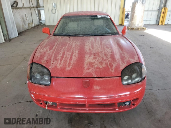 1999 Mitsubishi 3000GT z VIN JA3AM44H3XY001394, wystawiony jako Copart lot #75942814 z przebiegiem 75 146 mil mil oraz Czysty tytuł • Clean title. Historia ofert i sprzedaży dostępna na DreamBid. Obrazek 5.