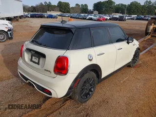 2015 MINI Hardtop 4 Door S z VIN WMWXU3C50F2B59450, wystawiony jako IAAI lot #41271841 z przebiegiem 70 719 mil mil oraz . Historia ofert i sprzedaży dostępna na DreamBid. Obrazek 4.