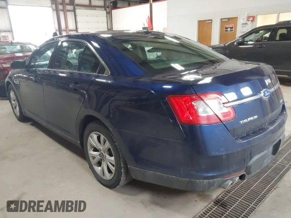 2011 Ford Taurus SEL with VIN 1FAHP2EW7BG174493, listed as a IAAI auction lot 41697856 with 143,957 mi miles. Bid and sale history available at carsss.com. Image 3.