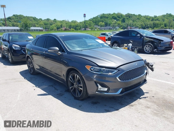 2020 Ford Fusion Titanium with VIN 3FA6P0K96LR173971, listed as a IAAI auction lot 42232469 with 82,474 mi miles and . Bid and sale history available at DreamBid. Image 1.