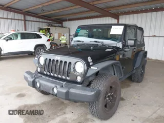 2015 Jeep Wrangler Sport with VIN 1C4AJWAG8FL550635, listed as a IAAI auction lot 42116285 with 111,782 mi miles. Bid and sale history available at carsss.com. Image 6.