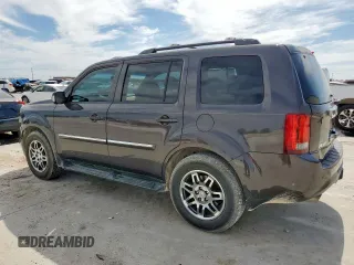 2013 Honda Pilot Touring with VIN 5FNYF3H90DB030323, listed as a Copart auction lot 57914985 with 226,792 mi miles and Salvage title. Bid and sale history available at DreamBid. Image 2.