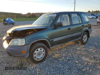 2000 Honda CR-V LX with VIN JHLRD1848YC038520, listed as a Copart auction lot 74137634 with 104,332 mi miles and Salvage Title. Bid and sale history available at carsss.com. Image 1.
