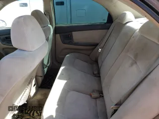2004 Kia Spectra LX z VIN KNAFE122145052033, wystawiony jako Copart lot #47457493 z przebiegiem 148 663 mil mil oraz Czysty tytuł • Clean title. Historia ofert i sprzedaży dostępna na DreamBid. Obrazek 6.