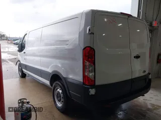 2023 Ford Transit Cargo with VIN 1FTBR1Y87PKA20405, listed as a IAAI auction lot 41907508 with 26,846 mi miles and . Bid and sale history available at DreamBid. Image 3.