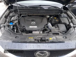 2021 Mazda CX-5 Signature with VIN JM3KFBEY8M0436075, listed as a Copart auction lot 85061194 with 66,471 mi miles and Salvage Title. Bid and sale history available at carsss.com. Image 12.
