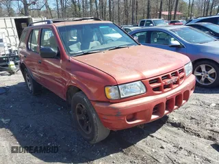 2000 Isuzu Rodeo S with VIN 4S2CK58W5Y4342386, listed as a IAAI auction lot 41778995 with 221,718 mi miles. Bid and sale history available at carsss.com. Image 1.
