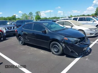 2019 Toyota Corolla L with VIN 5YFBURHE4KP860848, listed as a IAAI auction lot 42167529 with 152,301 mi miles. Bid and sale history available at carsss.com. Image 1.