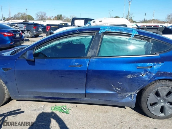 2023 Tesla Model 3 with VIN 5YJ3E1EA0PF612474, listed as a IAAI auction lot 41263078 with 31,750 mi miles. Bid and sale history available at carsss.com. Image 14.