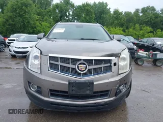 2012 Cadillac SRX Premium Collection z VIN 3GYFNCE3XCS620507, wystawiony jako IAAI lot #42348835 z przebiegiem 184 737 mil mil oraz . Historia ofert i sprzedaży dostępna na DreamBid. Obrazek 12.