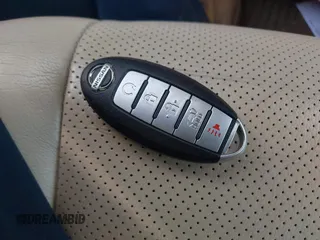 2016 Nissan Murano SL z VIN 5N1AZ2MH2GN121451, wystawiony jako IAAI lot #41950968 z przebiegiem 96 298 mil mil oraz . Historia ofert i sprzedaży dostępna na DreamBid. Obrazek 11.