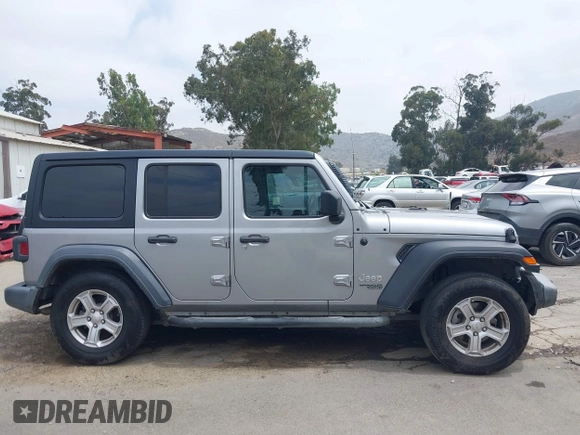 2018 Jeep Wrangler Unlimited Sport S with VIN 1C4HJXDN5JW145340, listed as a IAAI auction lot 42420695 with 92,500 mi miles and . Bid and sale history available at DreamBid. Image 13.