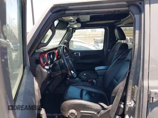 2023 Jeep Wrangler Rubicon with VIN 1C4JJXFG7PW541813, listed as a IAAI auction lot 42640045 with 53,645 mi miles and . Bid and sale history available at DreamBid. Image 5.