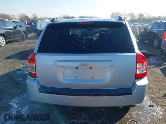 2008 Jeep Compass Sport with VIN 1J8FT47098D665734, listed as a IAAI auction lot 41561801 with 169,446 mi miles. Bid and sale history available at carsss.com. Image 16.