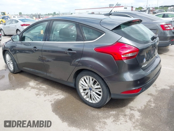 2018 Ford Focus Titanium with VIN 1FADP3N28JL323825, listed as a IAAI auction lot 42341286 with 46,565 mi miles and . Bid and sale history available at DreamBid. Image 3.