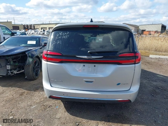 2023 Chrysler Pacifica Hybrid Limited with VIN 2C4RC1S78PR551260, listed as a IAAI auction lot 41992752 with 55,136 mi miles. Bid and sale history available at carsss.com. Image 16.