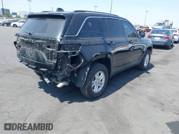 2022 Jeep Grand Cherokee Laredo with VIN 1C4RJHAG2N8595697, listed as a IAAI auction lot 42349561 with 39,073 mi miles and . Bid and sale history available at DreamBid. Image 4.