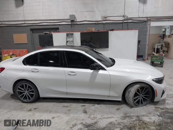 2019 BMW 3 Series 330i xDrive with VIN WBA5R7C55KAJ83482, listed as a IAAI auction lot 41565321 with 126,536 mi miles. Bid and sale history available at carsss.com. Image 13.
